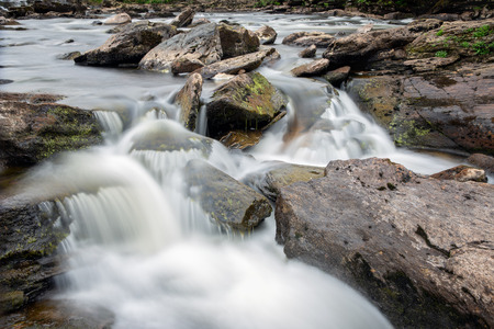 Falls of Dochart near Killin in Scottish Highlands, long exposure photographの写真素材