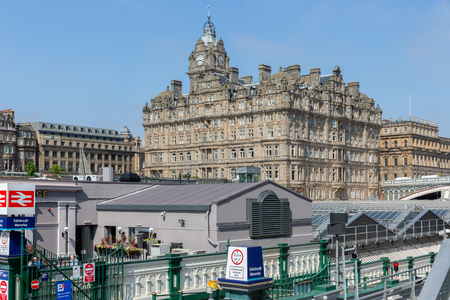 Edinburgh, Scotland - May 24, 2018: Edinburgh Waverley Railway station. In the background Palm Court hotelのeditorial素材