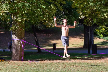 Luxembourg city, Luxembourg - August 18, 2018: Parc municipal in Luxembourg city with tightrope walk of unknown artistのeditorial素材