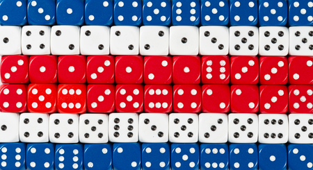 National flag of Costa Rica in colorful background of dices
