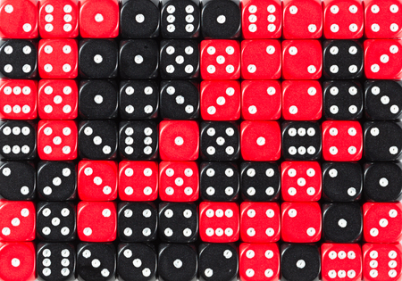 Pattern background of 70 random ordered black and red dices
