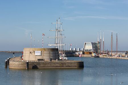 Lelystad, The Netherlands - February 23, 2019: Harbor with pier and restaurant in capital city...