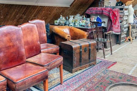 Weerselo, The Netherlands - August 16, 2019: Exposition of vintage furniture at Dutch flea marketのeditorial素材