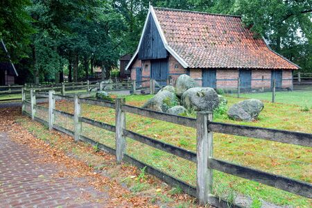 Ootmarsum, The Netherlands - August 18, 2019: Dutch rural open-air museum with old shedのeditorial素材
