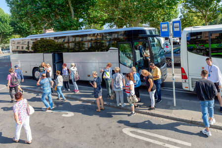 Luxembourg city, Luxembourg- August 19, 2018: Bus-stop with travellers leaving a coach downtown...