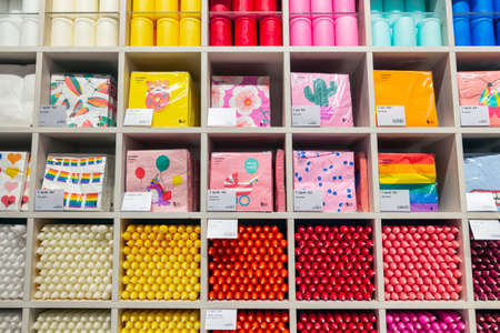 Krakow, Poland - May 13, 2019: Shop window with colorful candles and napkins