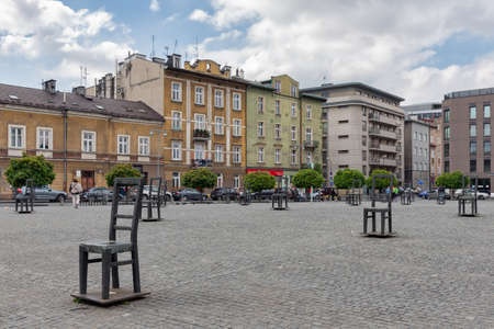Krakow, Poland - May 16, 2019: Empty Chairs memorial of Jewish victims of WW2, located at Ghetto Heroes Squareのeditorial素材