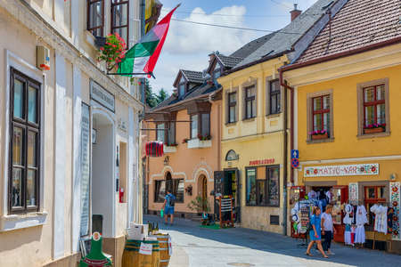 Eger, Hungary - July 05, 2019: Souvenir shops and shopping people downtown medieval city Eger, Hungaryのeditorial素材