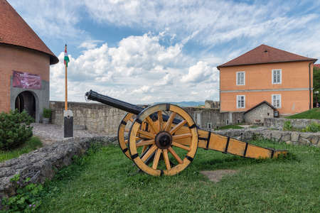 Eger, Hungary - July 05, 2019: Medieval cannon with reed shelters on top of hill Eger Castle in Hungaryのeditorial素材