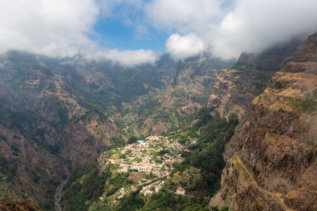 View at sun-drenched mountain village Curral das Freiras at Madeira Island, Portugal