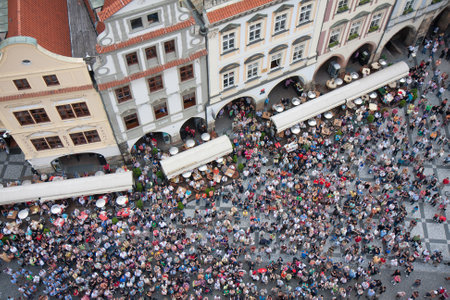Praha, Czech Republic - Juli 21, 2009: Looking downward from tower Old Town Hall. People is waiting for striking of the astronomical clockのeditorial素材