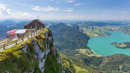 Sankt Wolfgang, Austria - Juli 19, 2017: Mountain hut at beautiful viewpoint top Schafberg near Sankt Wolfgang in Austriaのeditorial素材