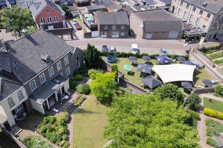 Aerial view village centre Dutch city Cuijk along river Meuseのeditorial素材