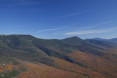 Eastern side of Franconia Notch in the White Mountains of New Hampshire in October at peak of fall...