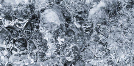 Ice patterns. Frozen water forming abstract shapes.