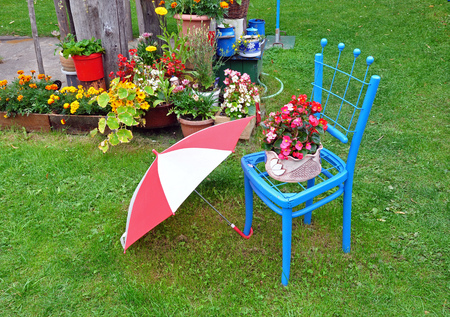 Decoration of garden with chair and umbrellaの写真素材