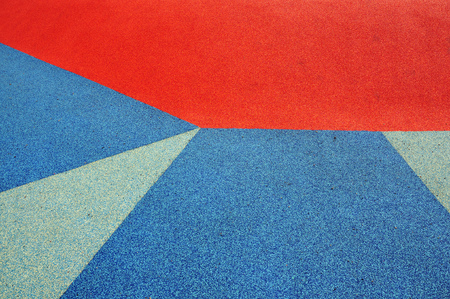 Three colors of outdoor outdoor playground area in contact.の写真素材
