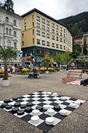 Black and white checkerboard on the square in Zell am See. Austria.の写真素材