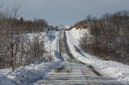 Snowy village roadの写真素材