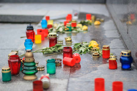 Lviv, Ukraine - 5th of March, 2014: Memorial of Stepan Bendera, with candles. Ukrainian war with...