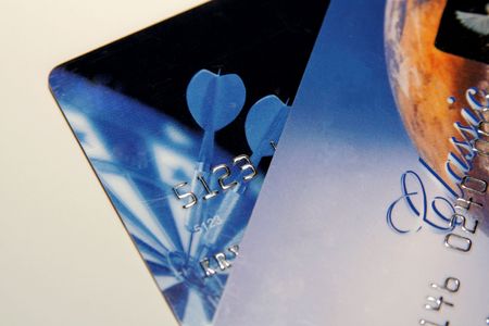 Two colorful credit cards on a light backgroundの写真素材