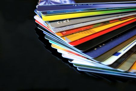 colorful credit cards on a dark backgroundの写真素材