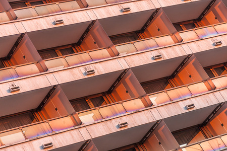 Architectural pattern, red facade with balconies. Old hotel in Budapest, Hungaryの写真素材