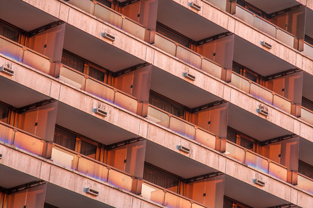 Architectural pattern, red facade with balconies. Old hotel in Budapest, Hungaryの写真素材