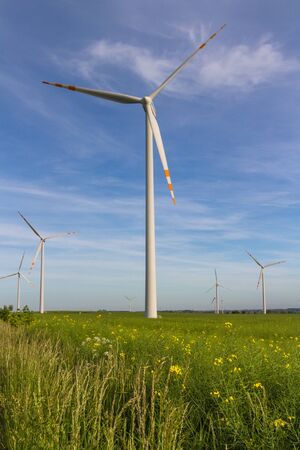 Eco power. Wind farm Renewable energy resources. Wind turbine field in Polandの写真素材