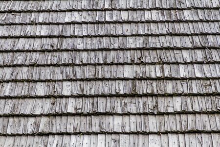 Closeup. Background. Dark wood texture. Traditional rustic wooden roof from Polandの写真素材