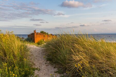 An old rusty and damaged batteship wreck on the beach. Hel, Polandの写真素材