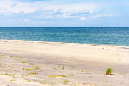 View of Baltic sea coast. Summer landscape. A lonely beach with white sand and blue sea. Hel, Hel Peninsula, Pomerania, Polandの写真素材