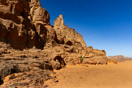 Amazing red rock formations. Sandstone rock formations. Tamezguida or "The Cathedral" (La Cathedrale). Tassili N'Ajjer National Park, Sahara, Algeria, Africaの写真素材