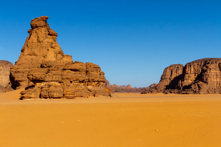 Amazing red rock formations. Sandstone rock formations. Tamezguida or "The Cathedral" (La Cathedrale). Tassili N'Ajjer National Park, Sahara, Algeria, Africaの写真素材