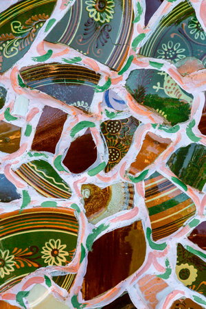 Mosaic background. Close up. Wall mosaic with colorful broken ceramic plates.の写真素材