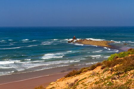 Picturesque seaside cliffs and rocks on the Atlantic Ocean coast. Legzira (Gzira ore) beach. Morocco, Africaの写真素材