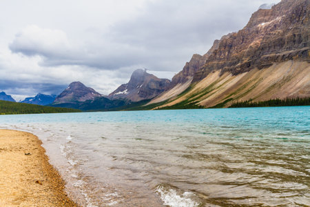 The landscape of the Canadian Rocky Mountains. Bowl Lake on a foggy cloudy day. Banff National Park, Alberta, Canadaの写真素材