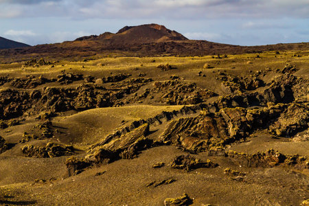 "Malpais" - barren and stony field of lava Colorada volcano. Lanzarote, Canary Islands, Spainの写真素材