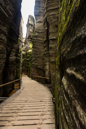 Unusual rock formations. A narrow passageway between rocks. Canyon slot. National Nature Reserve Adrspach-Teplice Rocks.Bohemia region, Czech Republicの写真素材