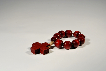 Small wooden rosary with crossの写真素材