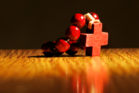 Small wooden rosary with crossの写真素材