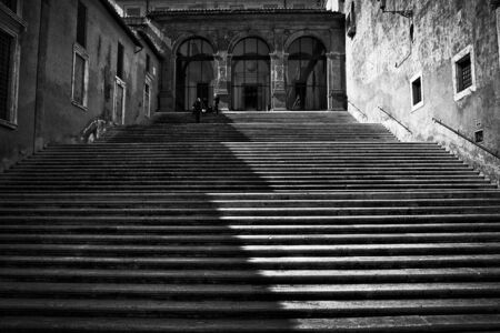 Ancient stairs in Rome in yachodyac sun rays.の写真素材