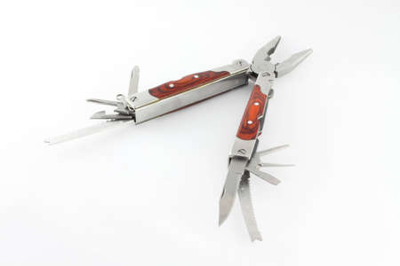 Knife with tools isolated on the white background.の写真素材