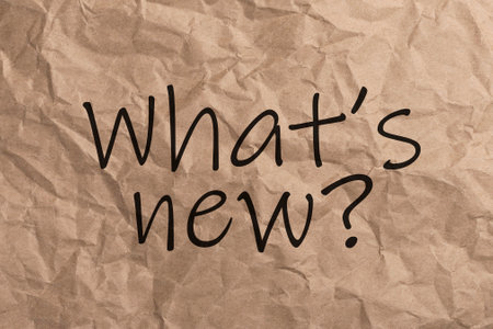 Text WHATS NEW on craft crumpled paper.の写真素材