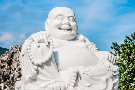 Fat laughing Buddha, Vietnamの写真素材