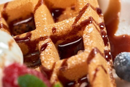 Dessert dish. Belgian waffles with ice cream, blueberries and raspberries.の写真素材