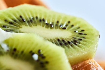 Belgian waffles with banana and kiwi. Dessert Belgian waffles with banana and kiwi.の写真素材