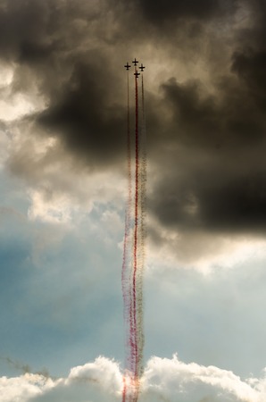 Airplanes on airshow. Aerobatic team performs flight at air showの写真素材