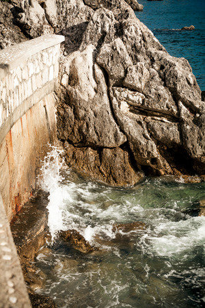 Beautiful landscape of sea waves breaking on high cliffsの写真素材