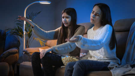 Two friends got upset after missing goal in football match watching on TV at night